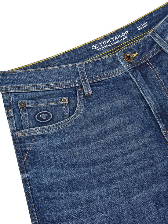 Blauwe denim jeans met een Tom Tailor logo op de zak en maat 33/32.