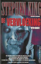 Boekomslag 'De Vervloeking' van Stephen King (Richard Bachman) met een enge schedelgezicht.