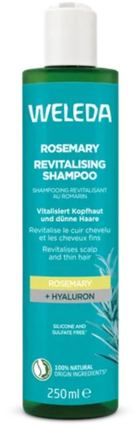 Bouteille de Shampooing Revitalisant au Romarin Weleda, 250 ml. Étiquette verte avec texte blanc et accents roses.