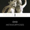 Livre 'Ovid Metamorphoses' avec une sculpture en marbre de deux figures et le logo Penguin Classics.