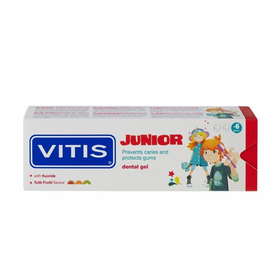 Doos Vitis Junior tandpasta met afbeeldingen van een jongen en een meisje met tandenborstels. Toont "Tutti Frutti flavour".