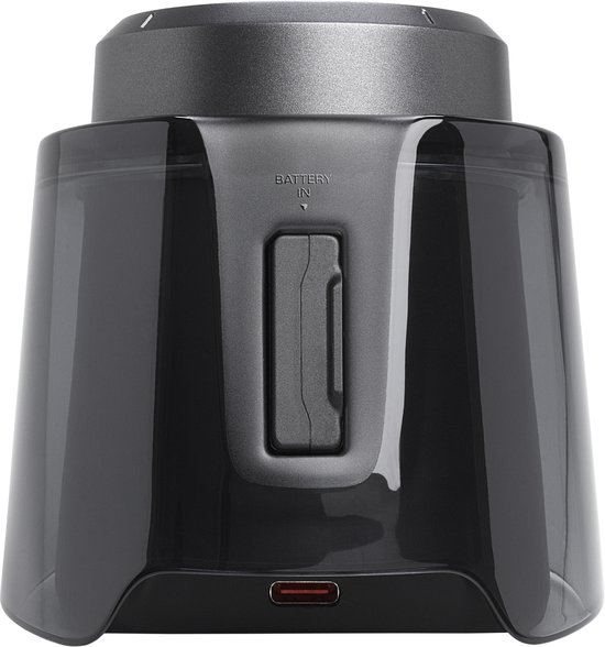 Transparante oplader voor headset met USB-C poort en een batterijcompartiment.