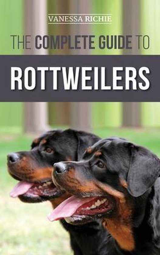 Boekomslag 'The Complete Guide to Rottweilers' met twee Rottweilers in de voorgrond.