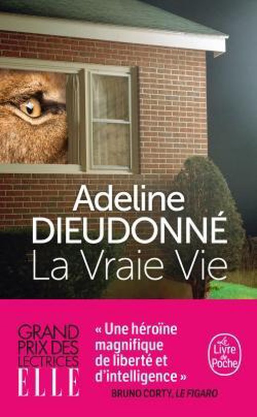 Couverture du livre "La Vraie Vie" d'Adeline Dieudonné, un œil d'animal regardant par une fenêtre.