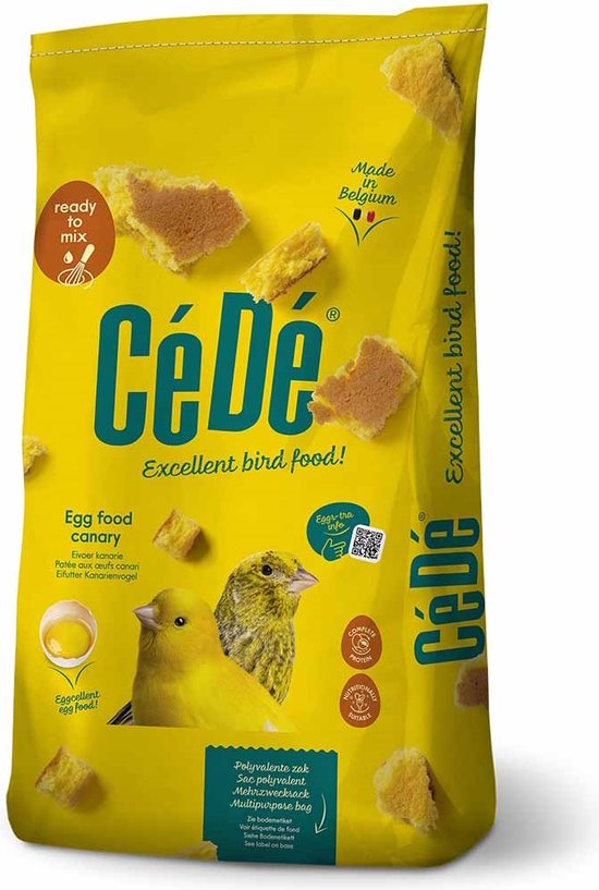 Gele zak met 'CéDé' logo, "Excellent bird food!" en "Egg food canary". Met afbeelding van twee kanaries en een gebroken ei.
