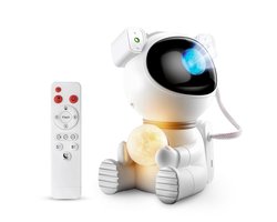 foto van Mobstore - Astronaut Sterren Projector - NIEUW 2 in 1 model - Sterrenhemel Projector - Sterrenlamp - Galaxy Projector - Afstandsbediening - 15+ kleurcombinaties - Maanlamp nachtlampje
