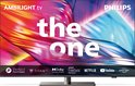 Philips Ambilight tv 'the one' met een abstract, kleurrijk design op het scherm en streaminglogo's onderaan.