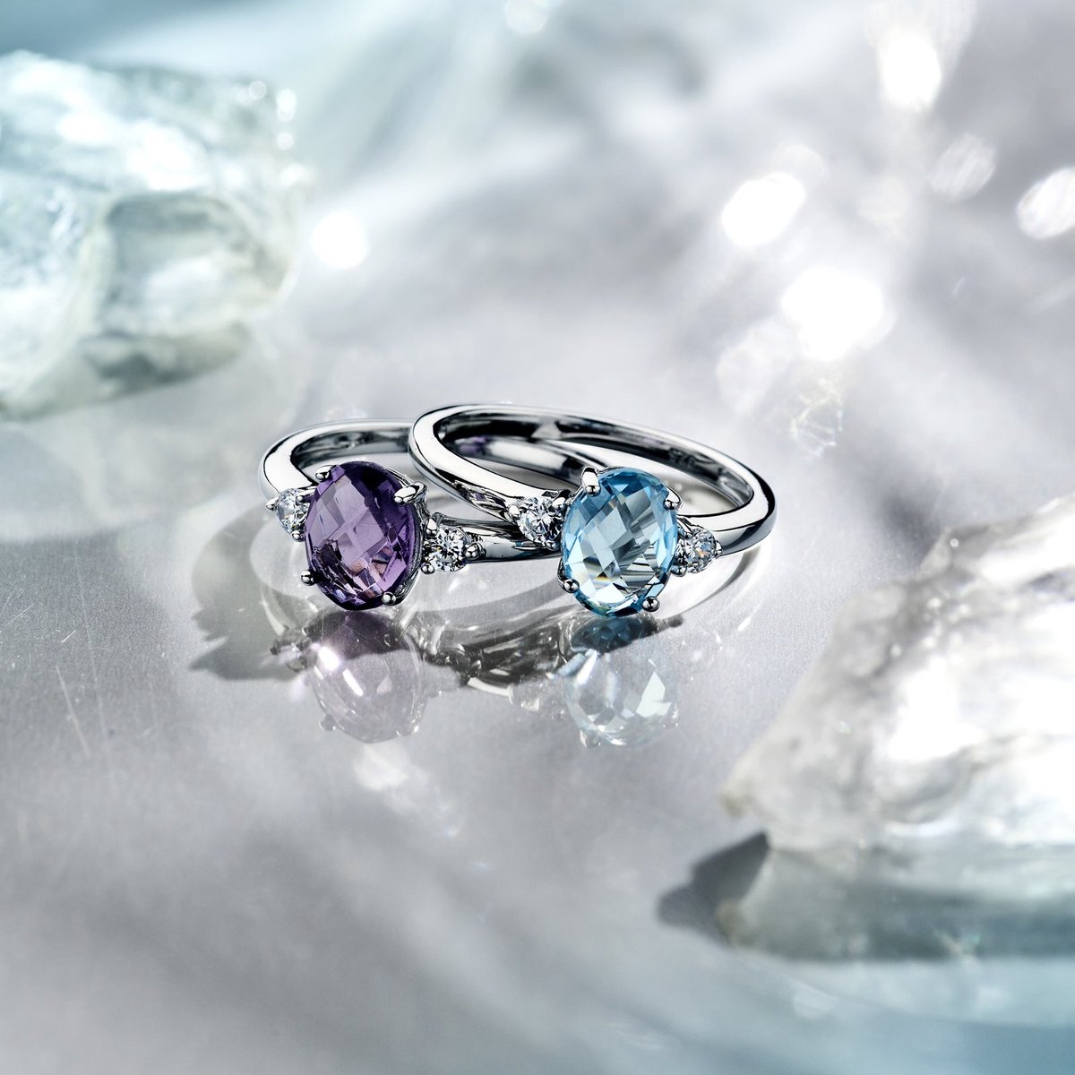Gerhodineerd Zilver Ring Trilogie Met Zirkonia En Blauw Topaas 1337796