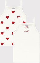 Wit topje met all-over rode hartjesprint en effen wit topje met 'Petit Bateau' opschrift en strikje.