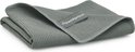 Chiffon gris en microfibre gaufré, plié avec une étiquette "Geweldigschoon".