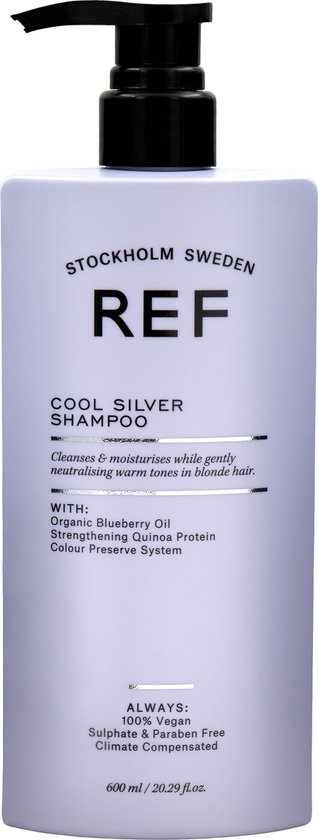 Lichtpaarse fles REF Cool Silver Shampoo met zwarte pompdispenser en tekst.
