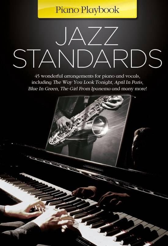 Boek Jazz Standards met 45 arrangementen voor piano en zang. Toont een piano en een saxofonist.