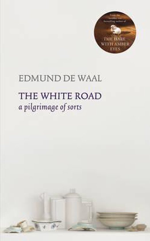 Wit boek 'The White Road' van Edmund de Waal met een illustratie van porselein op de voorkant.