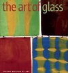 Boek "the art of glass" met vier kleurrijke, abstracte glaspanelen: geel-groen, donkerbruin, rood en blauw-geel.