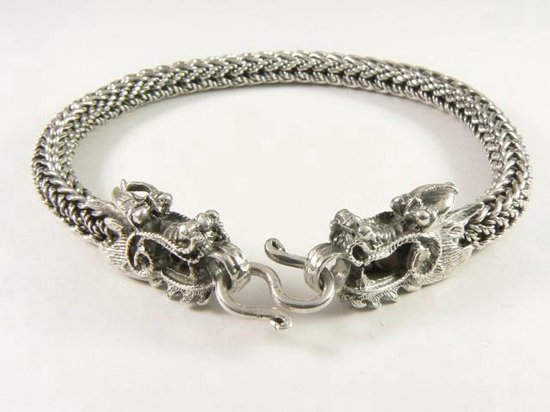 Gevlochten zilveren armband met drakenkoppen | bol.com