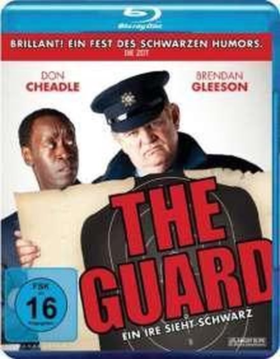 The Guard: Don Cheadle en Brendan Gleeson, met een schietschijf.