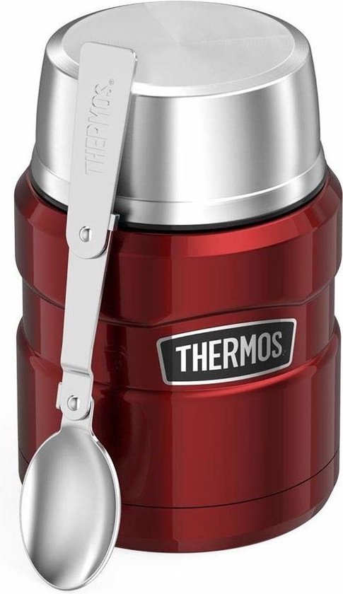 Contenant alimentaire Thermos rouge brillant avec couvercle argenté et une cuillère argentée attachée sur le côté.