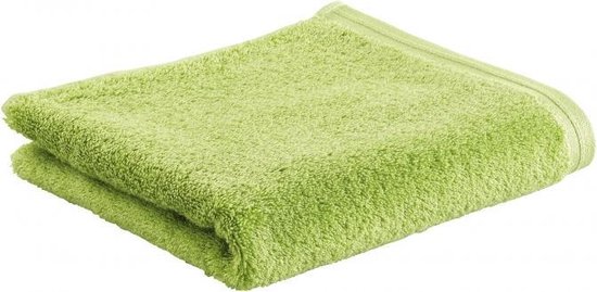 Une serviette Vossen d'aspect doux, de couleur vert avocat, pliée.