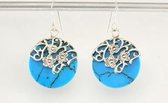Bewerkte zilveren oorbellen met blauwe turkoois