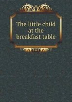 The little child at the breakfast table