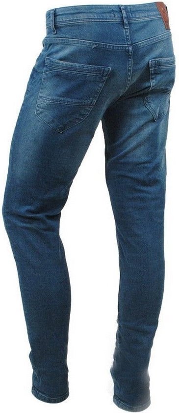 Donkerblauwe spijkerbroek, slim fit, van de achterkant gezien.