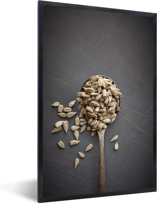 Photo encadrée - Graines de tournesol Witte sur un cadre photo surface grise noir 40x60 cm - Affiche encadrée (Décoration murale salon / chambre)