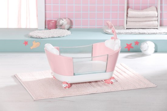 Roze Baby Annabell badkuip met schaapjes-pootjes, witte randen en glazen zijkanten met zeedierenprint.