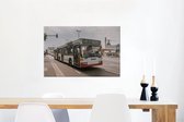 Canvas Schilderij Een moderne Duitse stadsbus - 90x60 cm - Wanddecoratie