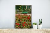 Canvas Schilderij Bankje met bloemen in de Franse tuin van Monet in Europa - 20x30 cm - Wanddecoratie