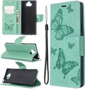 Voor Sony Xperia 20 Embossing Two Butterflies Pattern Horizontale Flip PU Leather Case met houder & kaartsleuf & portemonnee & lanyard (groen)