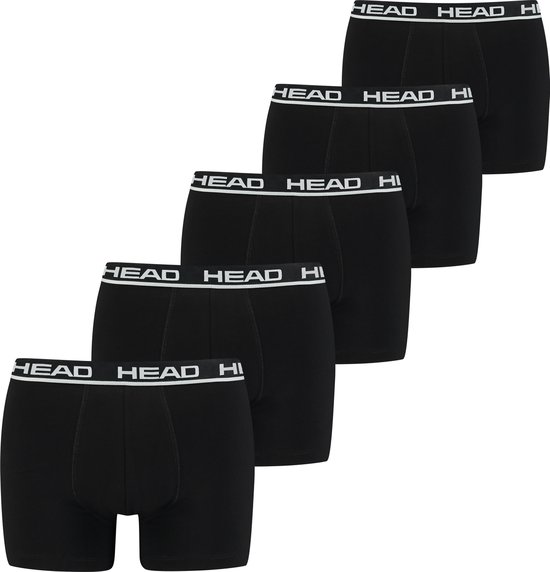 Zes zwarte boxer shorts met witte HEAD tailleband, opgesteld in een rij.