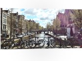 WallClassics - PVC Schuimplaat - Gracht in de Stad - 100x50 cm Foto op PVC Schuimplaat (Met Ophangsysteem)