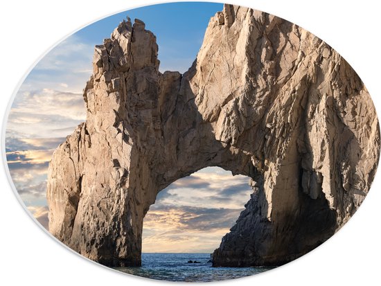 PVC Schuimplaat Ovaal - Grote Rotsen Boog genaamd ''The Arch of Cabo San Lucas'', Mexico - 40x30 cm Foto op Ovaal (Met Ophangsysteem)