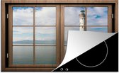KitchenYeah® Inductie beschermer 80.2x52.2 cm - Doorkijk - Vuurtoren - Zee - Kookplaataccessoires - Afdekplaat voor kookplaat - Inductiebeschermer - Inductiemat - Inductieplaat mat