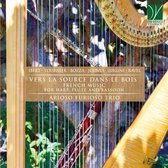 Boekhoes met een close-up van een harp, dwarsfluit en fagot, met de titel 'Vers La Source Dans Le Bois' en 'Arioso Furioso Trio'.