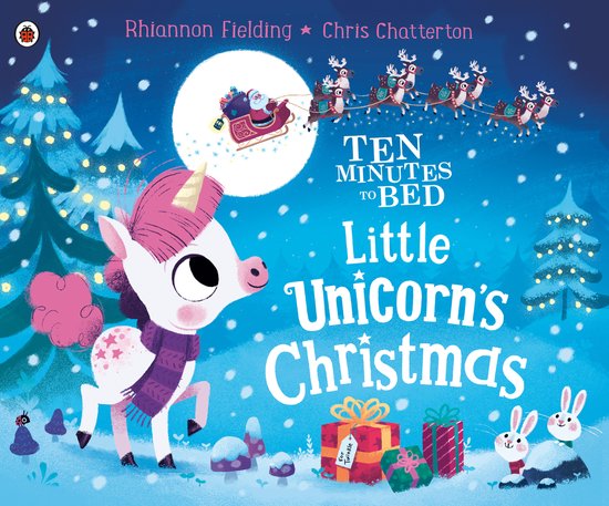 Boekomslag: 'Little Unicorn's Christmas Ten Minutes to Bed'. Een eenhoorn met paars sjaaltje staat in de sneeuw. Kerstman en rendieren vliegen over de maan.