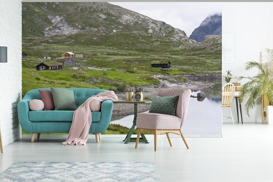 Chalets près d'un lac en Norvège fotobehang