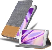 Cadorabo Hoesje voor Samsung Galaxy J7 2016 in LICHTGRIJS BRUIN - Beschermhoes met magnetische sluiting, standfunctie en kaartvakje Book Case Cover Etui