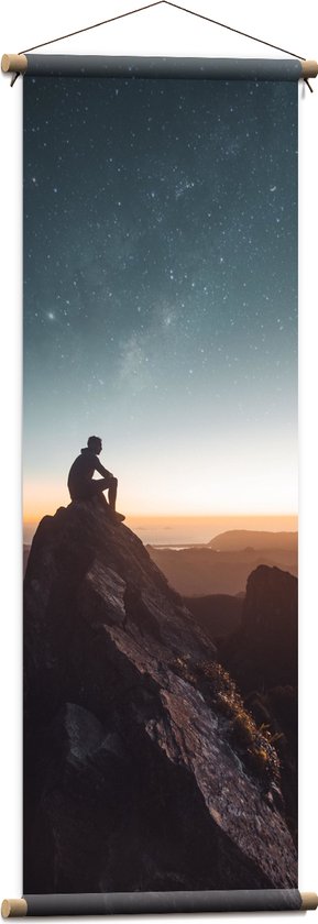 WallClassics - Textielposter - Man op Bergtop met Zonsondergang - 40x120 cm Foto op Textiel