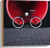 WallClassics - Hout - Zwart met Witte Fiets geparkeerd voor Oranje Tunnel - 50x50 cm - 9 mm dik - Foto op Hout (Met Ophangsysteem)