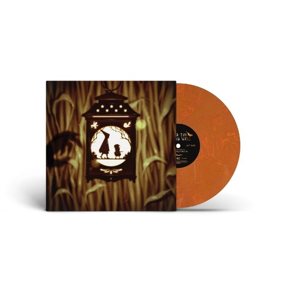 Vinyl LP in oranje marmerkleur, met hoes met een lantaarn met silhouetten van twee kinderen en maïs.