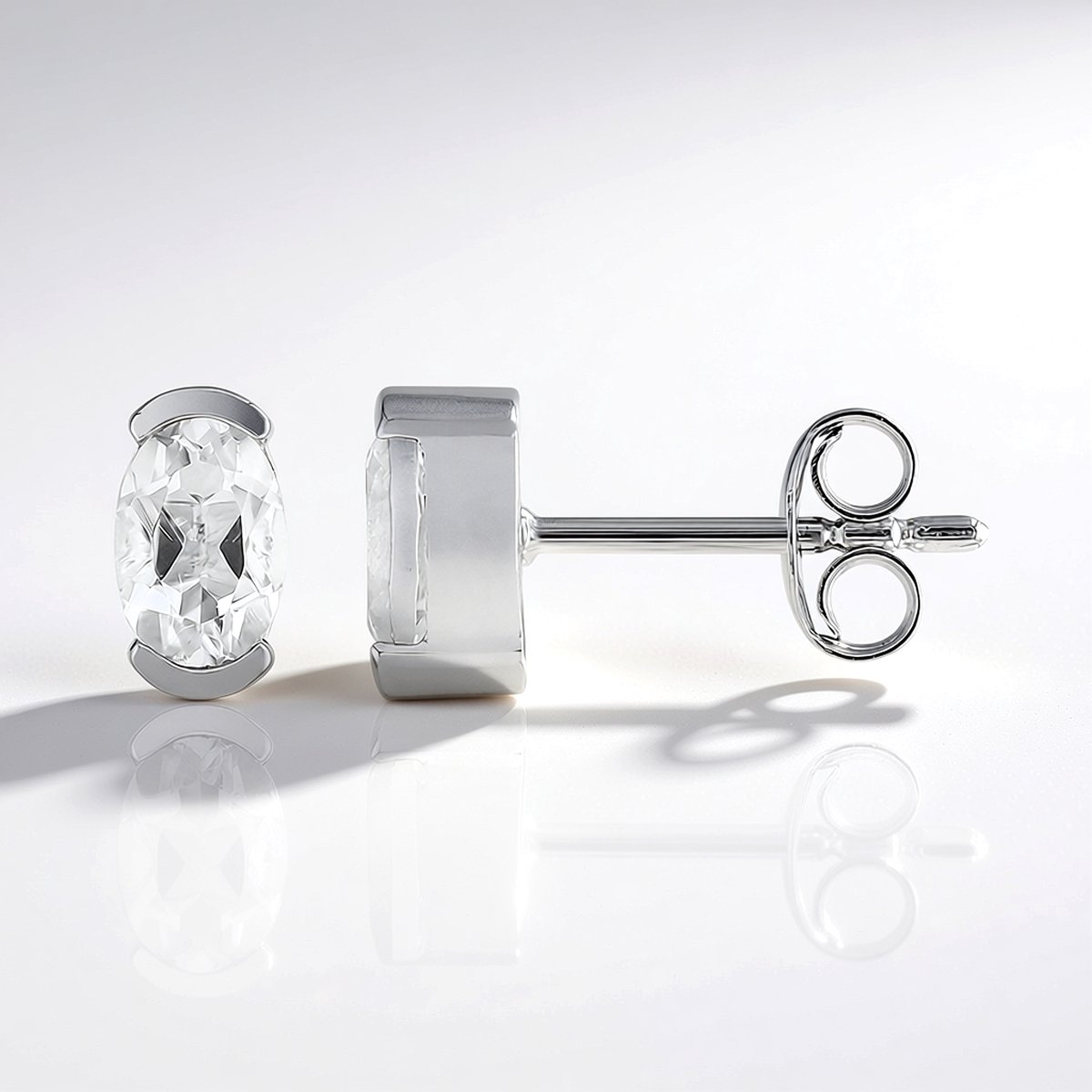Cavill - Zilveren Oorbellen met Witte Topaas - 925 Sterling Zilver Gerhodineerd - 2x Ovale Nigeriaanse Topaas 1,012 Ct - Luxe Elegante Dames Oorbellen