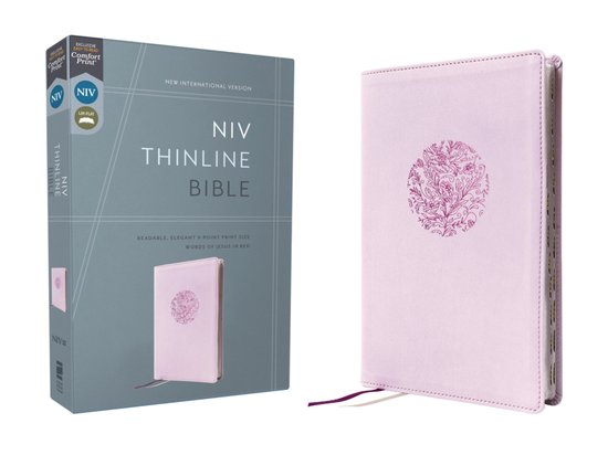 Lichtroze NIV Thinline Bijbel met een paars bloemenpatroon op de voorkant en paarse leeslinten.