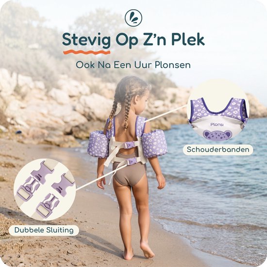 Meisje met bruine staartjes draagt een beige zwemvest met paarse panterprint. Dubbele sluiting.