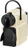 Machine à café à capsules Nespresso Inissia crème avec poignée noire, vue de dessus.