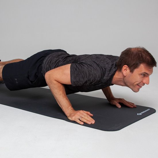 Schildkröt fitnessmat 10mm antislip grijs met draagriem en tips. van Schildkröt — afbeelding 3