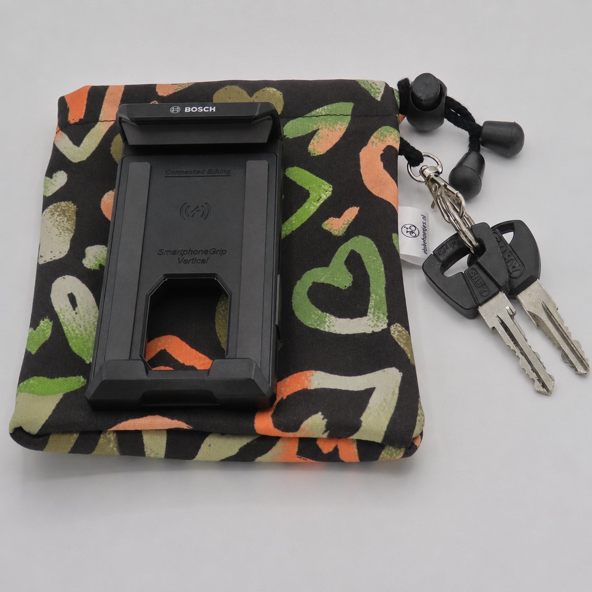 Ebike hoesje xl display Bosch Smartphone grip verticaal Hartje op zwart softshell DLX