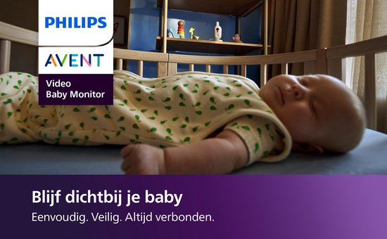 Baby slaapt in een ledikantje, gefilmd door een Philips Avent videobabyfoon.
