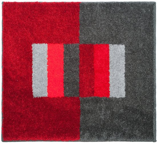 Badmat met blokpatroon: twee helften rood en grijs, met rechthoeken in rood en grijs in het midden.