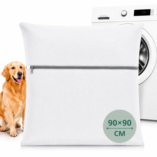 Sac à linge blanc 90x90 cm avec fermeture éclair, à côté d'un Golden Retriever assis et d'une machine à laver.